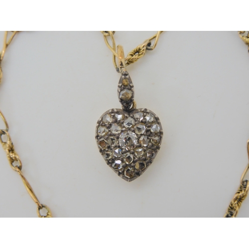 572 - A DIAMOND SET LOCKET BACK HEART SHAPED PENDANT