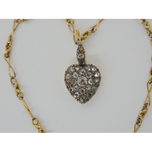 572 - A DIAMOND SET LOCKET BACK HEART SHAPED PENDANT