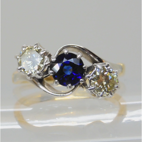 582 - A SAPPHIRE AND OLD CUT DIAMOND THREE STONE RING