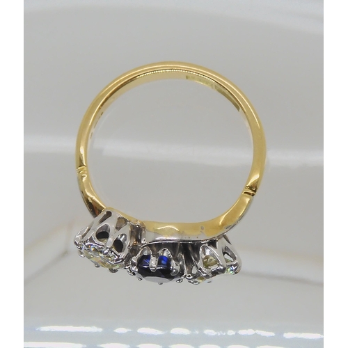 582 - A SAPPHIRE AND OLD CUT DIAMOND THREE STONE RING