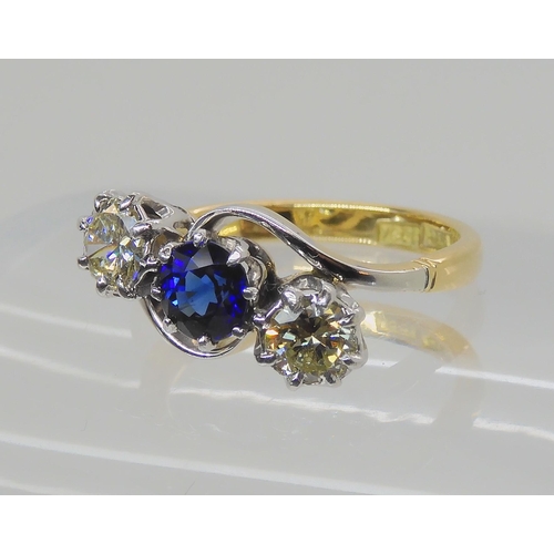 582 - A SAPPHIRE AND OLD CUT DIAMOND THREE STONE RING