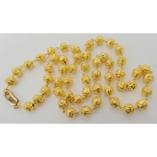 591 - A BRIGHT YELLOW METAL BEAD NECKLACE  AND BRACELET