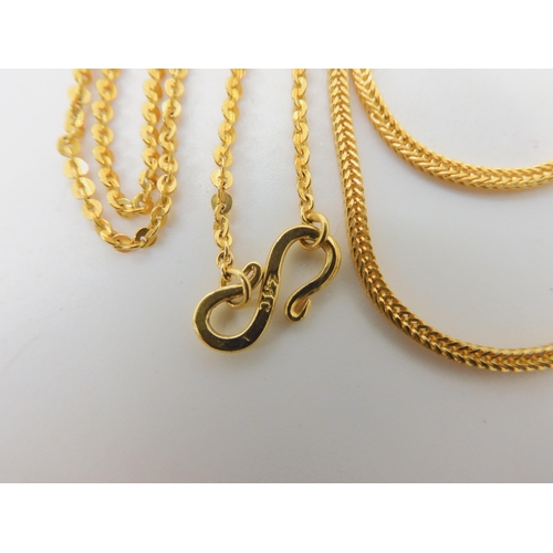 595 - TWO INDIAN GOLD CHAINS