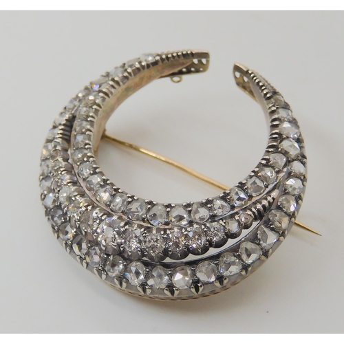 611 - A VICTORIAN DIAMOND CRESCENT MOON BROOCH