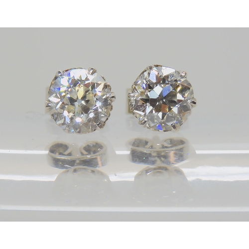 614 - A PAIR OF SUBSTANTIAL DIAMOND STUD EARRINGS