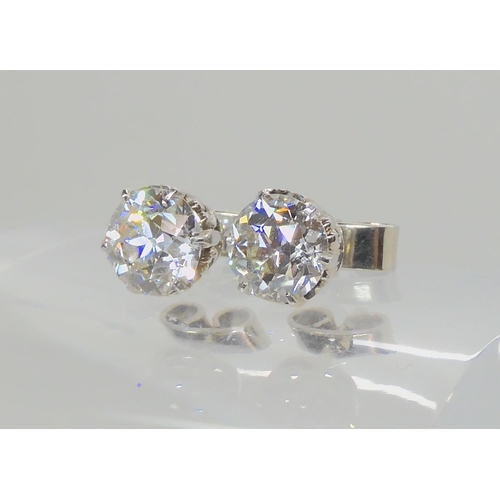 614 - A PAIR OF SUBSTANTIAL DIAMOND STUD EARRINGS