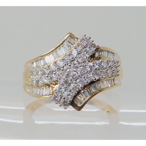 629 - A 9CT GOLD DIAMOND CLUSTER RING