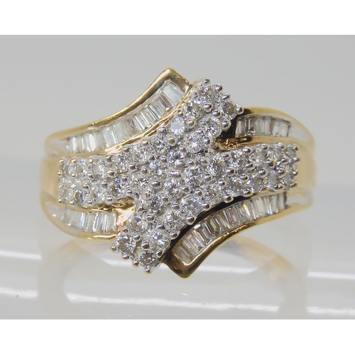 629 - A 9CT GOLD DIAMOND CLUSTER RING