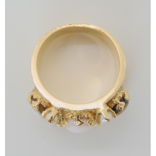 643 - A YELLOW METAL CAMEO TRIO AND PEARL RING