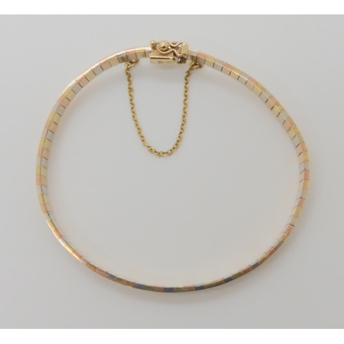 650 - A 9CT TRICOLOUR GOLD BRACELET