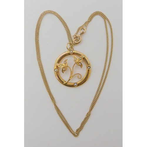 654 - A 14K GOLD PEARL SET EDWARDIAN PENDANT