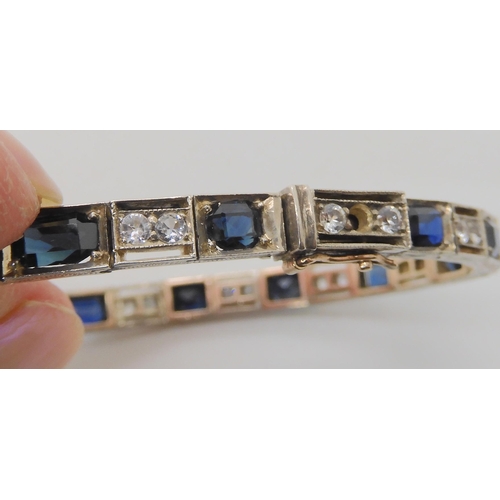 657 - A BLUE AND WHITE SAPPHIRE BRACELET