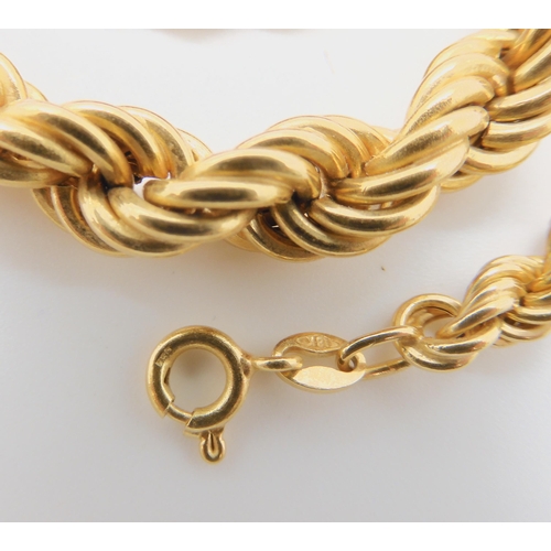 669 - AN 18K GOLD TAPERED ROPE CHAIN