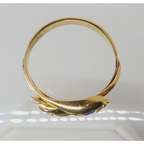 672 - AN 18CT GOLD SAPPHIRE AND DIAMOND SNAKE RING