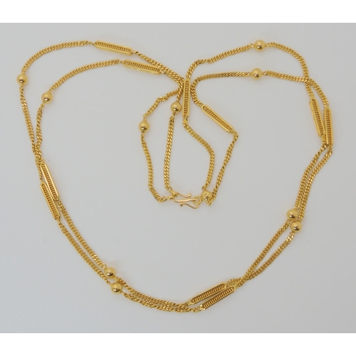 674 - A BRIGHT YELLOW METAL DOUBLE LENGTH FANCY CHAIN