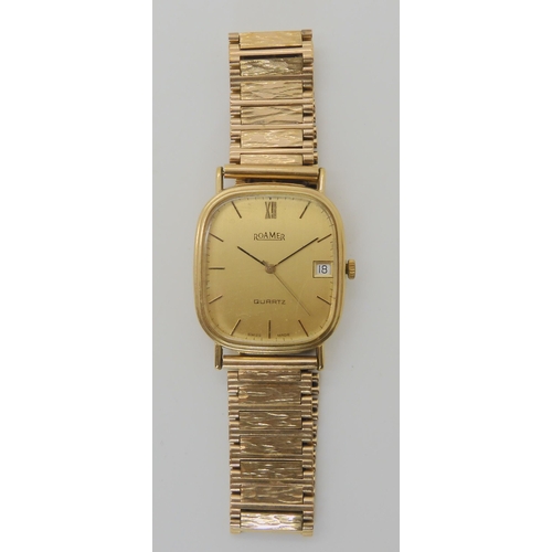 704 - A 9CT GOLD GENTS ROAMER QUARTZ WATCH