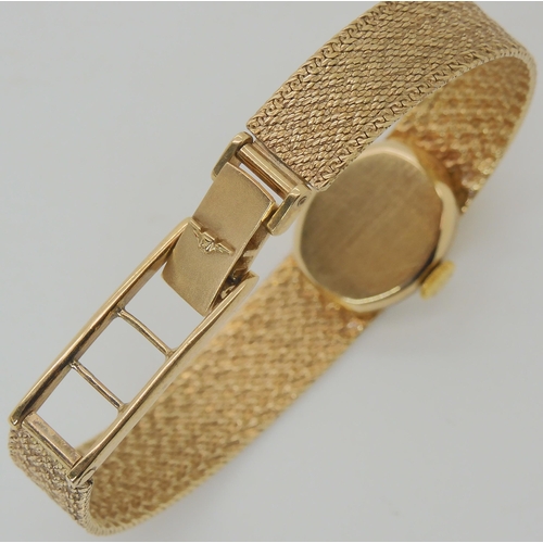 708 - A 9CT GOLD LADIES LONGINES WRIST WATCH