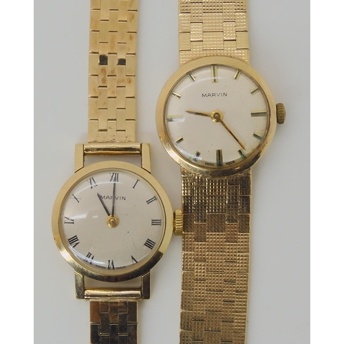 712 - TWO 9CT GOLD LADIES MARVIN WATCHES