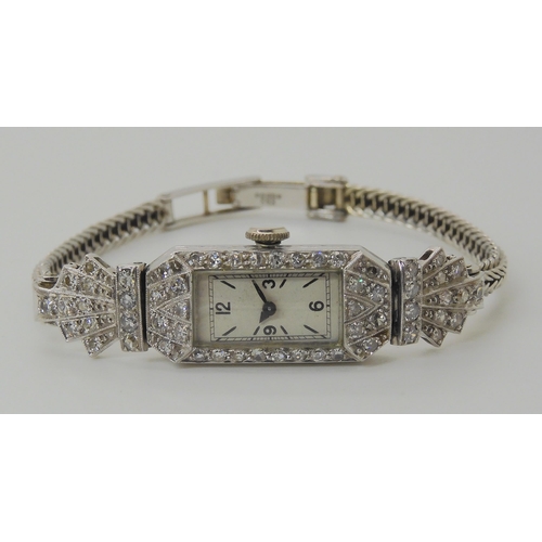 713 - AN ART DECO DIAMOND SET COCKTAIL WATCH