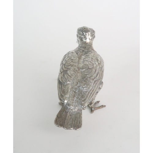 722 - A CONTINENTAL SILVER MODEL OF A STARLING