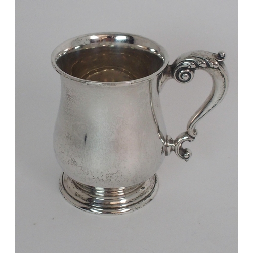 735 - A SILVER TANKARD