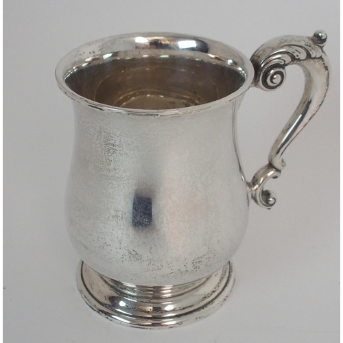 735 - A SILVER TANKARD