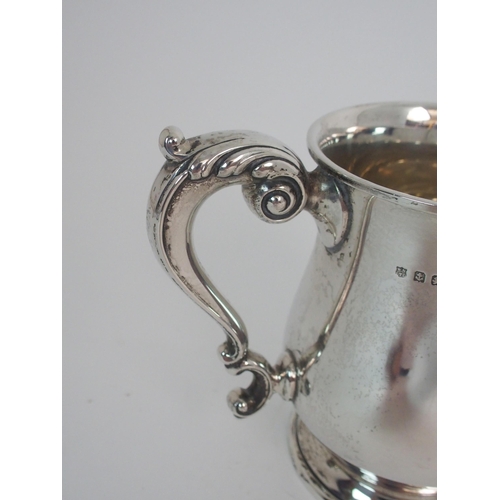 735 - A SILVER TANKARD