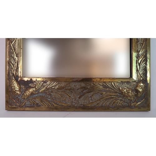 242 - A SCOTTISH ARTS AND CRAFTS BRASS FRAMED MIRROR