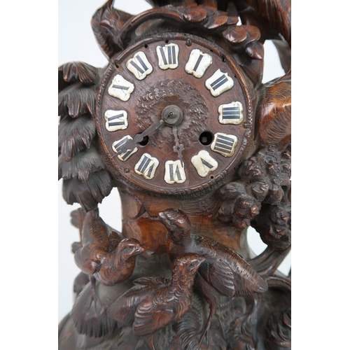 251 - A LATE 19TH CENTURY BLACK FOREST CLOCK