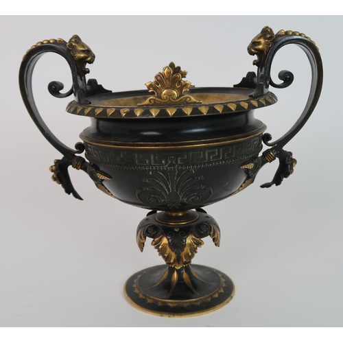 272 - A CLASSICAL BRONZE TWO HANDLED URN