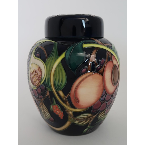 281 - A MOORCROFT QUEENS CHOICE GINGER JAR AND COVER