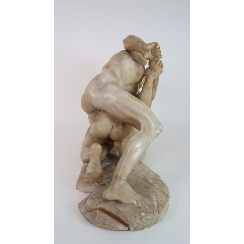 293 - A CARVED ALABASTER SCULPTURE OF THE WRESTLERS