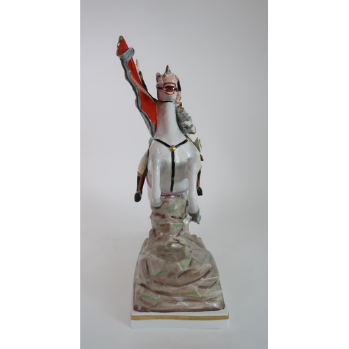 296 - A SITZENDORF FIGURE OF NAPOLEON CROSSING THE ALPS