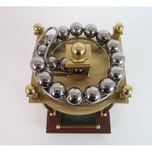 308 - A LATE 20TH CENTURY SPHERICAL WEIGHT CLOCK BY HARDING AND BAZELEY  CHELTENHAM