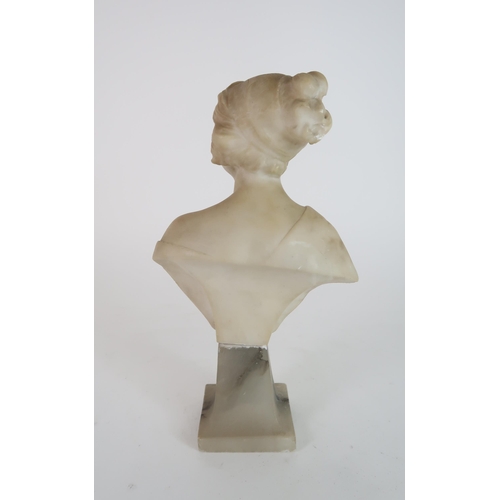 310 - AN ALABASTER BUST OF A YOUNG WOMAN