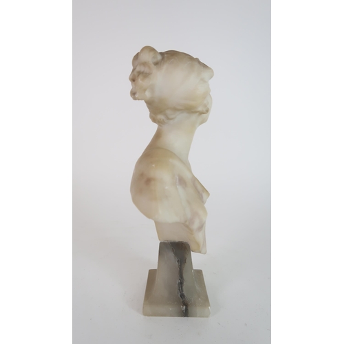 310 - AN ALABASTER BUST OF A YOUNG WOMAN