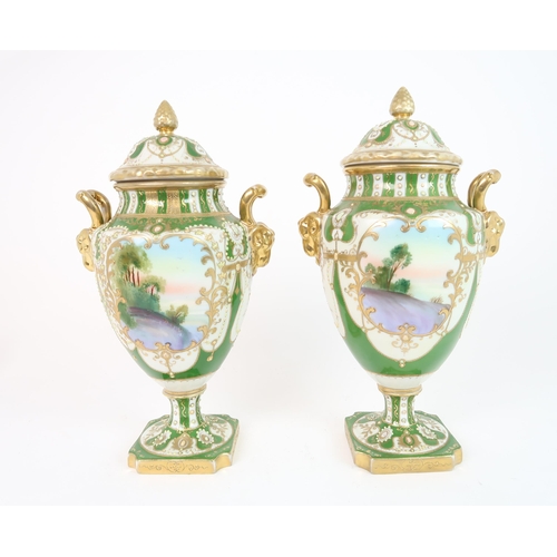 330 - A PAIR OF NORITAKE URNS AND COVERS