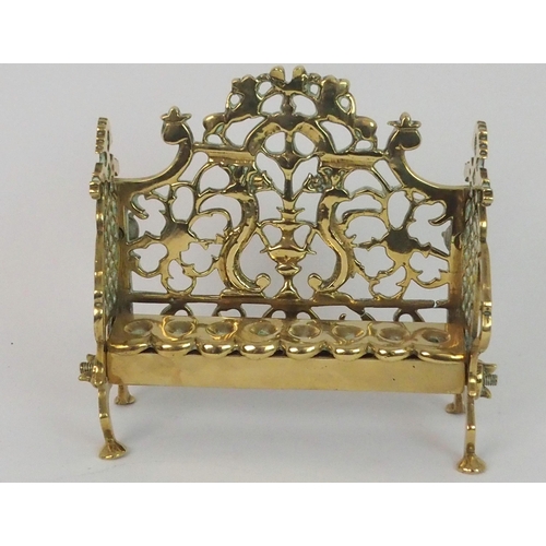 382 - A BRASS HANUKKAH WITH PIERCED BACK PLATE