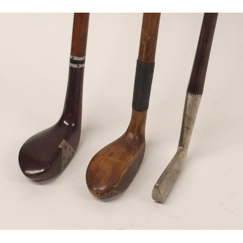 447 - THREE VARIOUS GOLF WALKING STICK