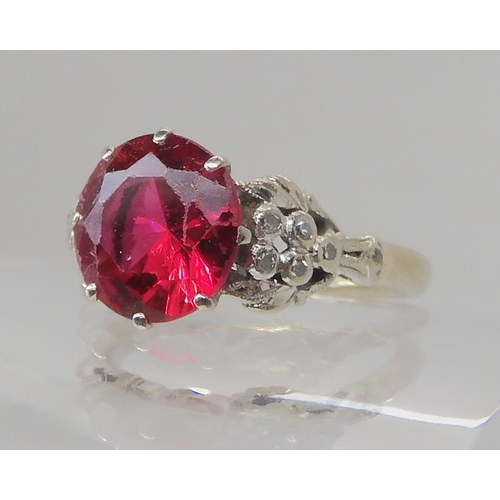 495 - AN 18CT WHITE GOLD FAUX RUBY AND DIAMOND RING