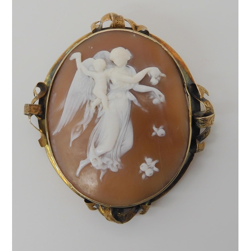 509 - A YELLOW METAL MOUNTED LARGE SHELL CAMEO