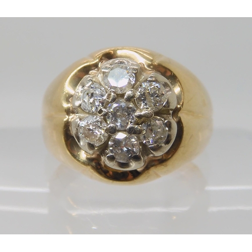 525 - A 10K GOLD GENTS DIAMOND FLOWER CLUSTER RING