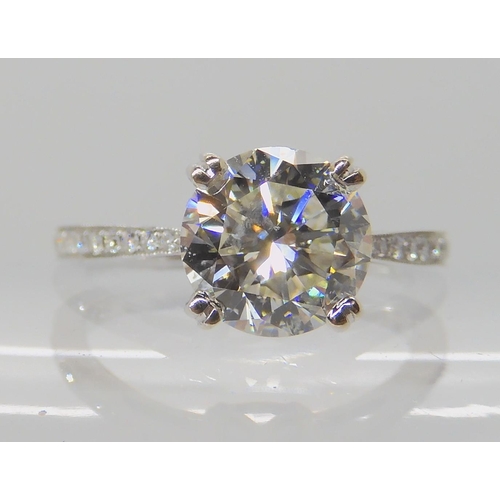 527 - AN 18CT WHITE GOLD DIAMOND SOLITAIRE RING