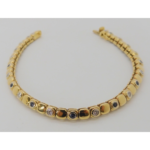 533 - AN 18CT GOLD SAPPHIRE AND DIAMOND BRACELET