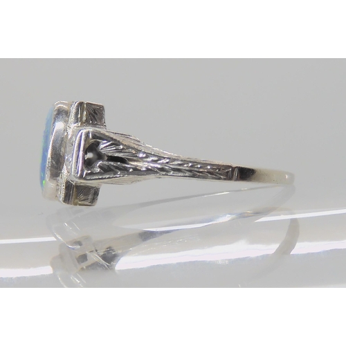 537 - AN 18K WHITE GOLD OPAL AND DIAMOND RING