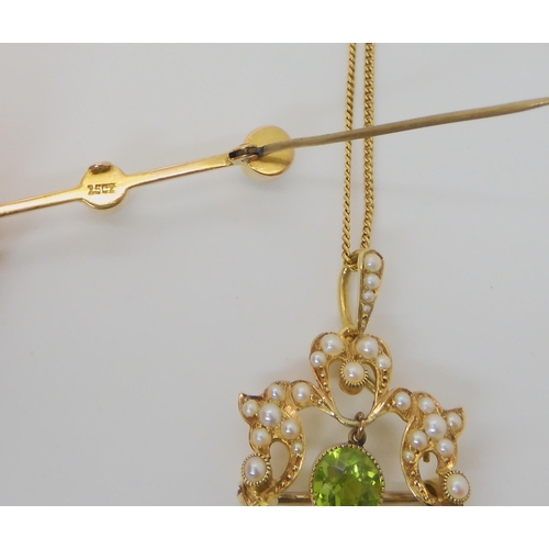 543 - AN EDWARDIAN PERIDOT AND PEARL PENDANT BROOCH