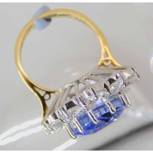 552 - A SUBSTANTIAL SAPPHIRE AND DIAMOND RING