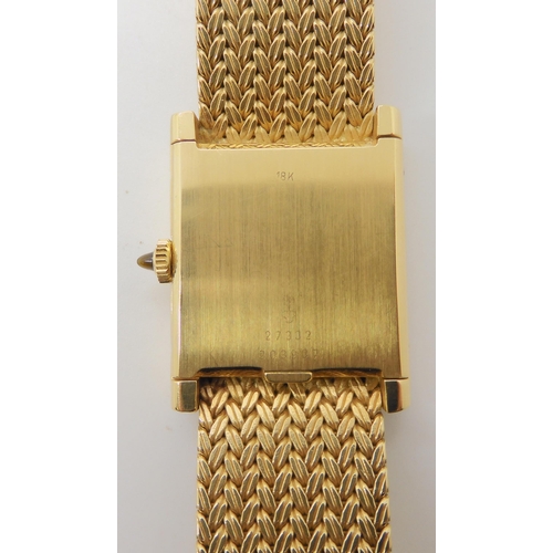 668 - AN 18CT GOLD  ONYX AND DIAMOND CORUM WRISTWATCH