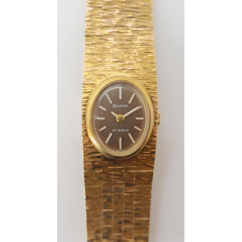 683 - A 9CT GOLD LADIES BULOVA RETRO WRISTWATCH