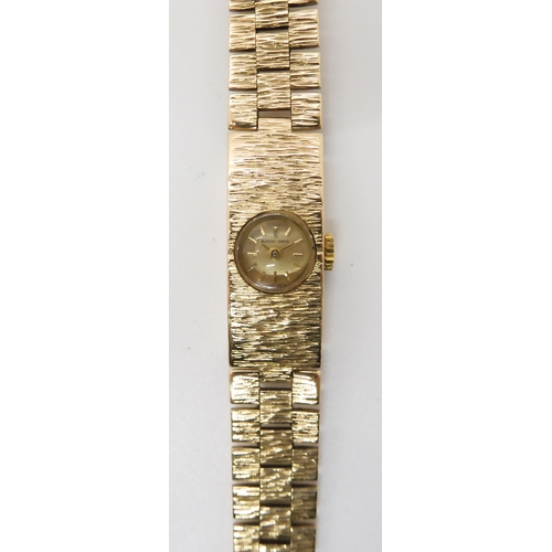 688 - A RETRO 9CT GOLD LADIES BUECHE GIROD WRISTWATCH